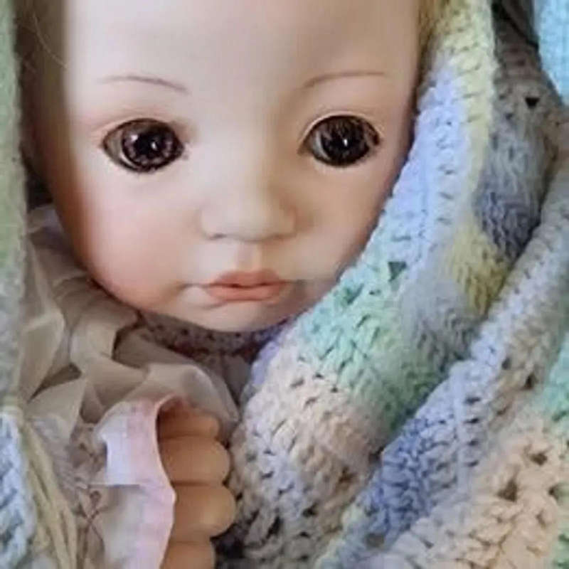 Sweet happy porcelain baby girl doll