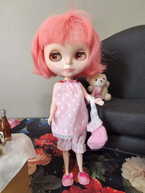 The Prima Dolly Peony Blythe doll is a cherished collectible, released in June 2008 as a CWC Limited
