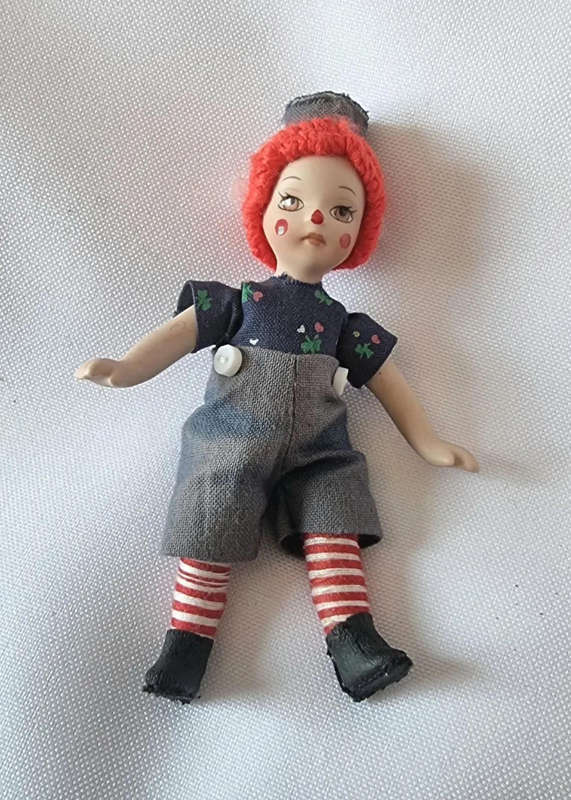Raggedy Ann and Raggedy Andy Miniature Porcelain Dolls