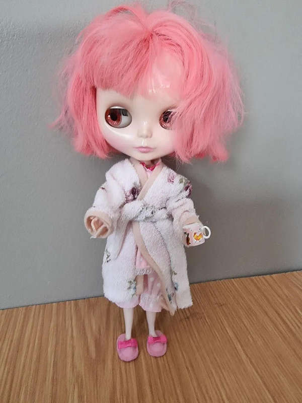The Prima Dolly Peony Blythe doll is a cherished collectible, released in June 2008 as a CWC Limited