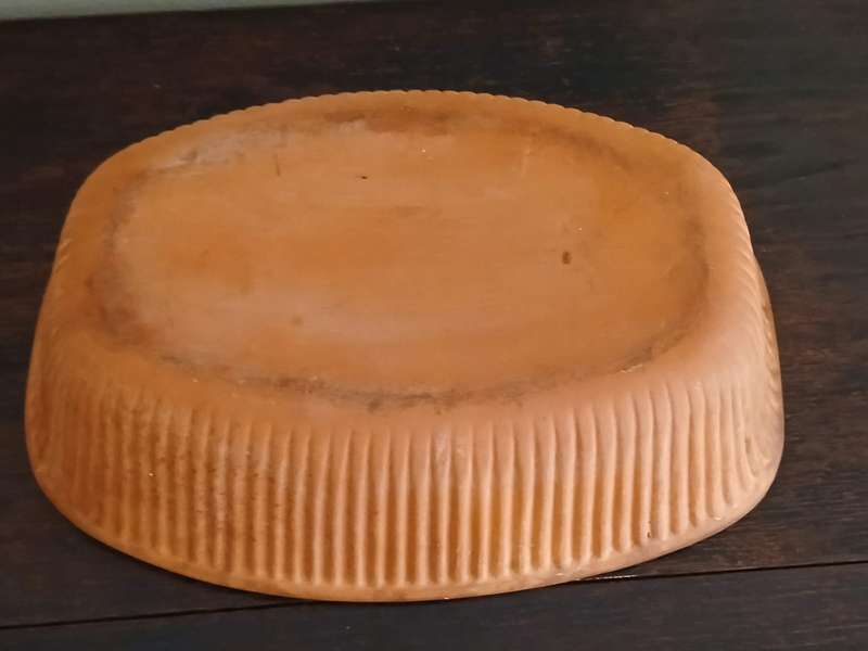 CP Clay Baker, for making moist roasts, braises, and bread.