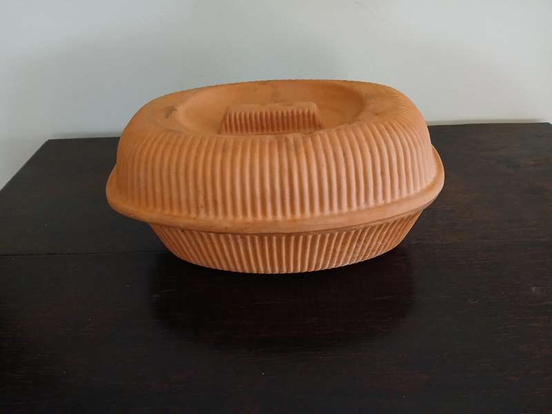 CP Clay Baker, for making moist roasts, braises, and bread.