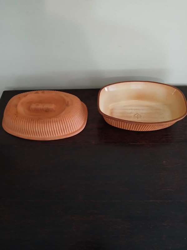 CP Clay Baker, for making moist roasts, braises, and bread.
