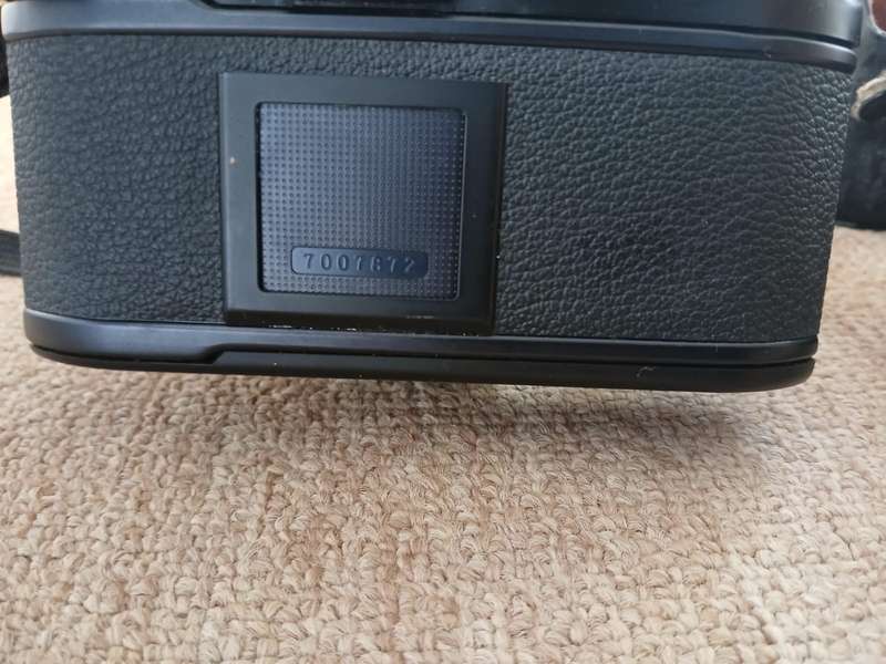 Nikon EM SLR 35mm Film Camera With 50mm Zoom Lens