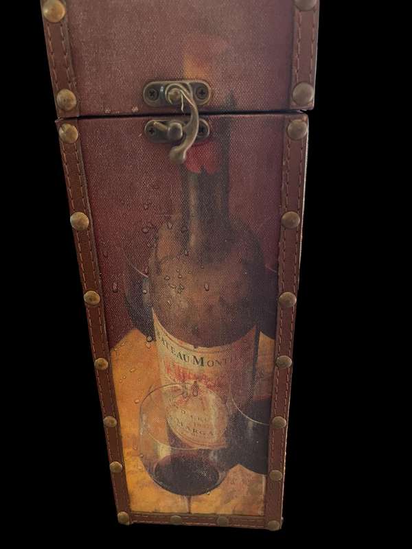 Wine bottle carrier/holder