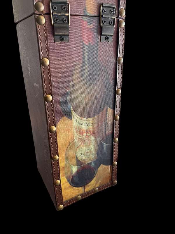 Wine bottle carrier/holder