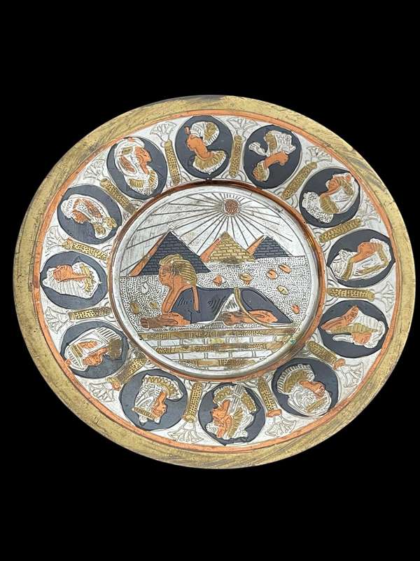 Plates Egypt brass each