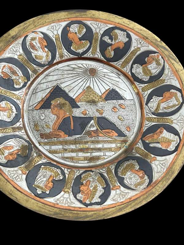 Plates Egypt brass each