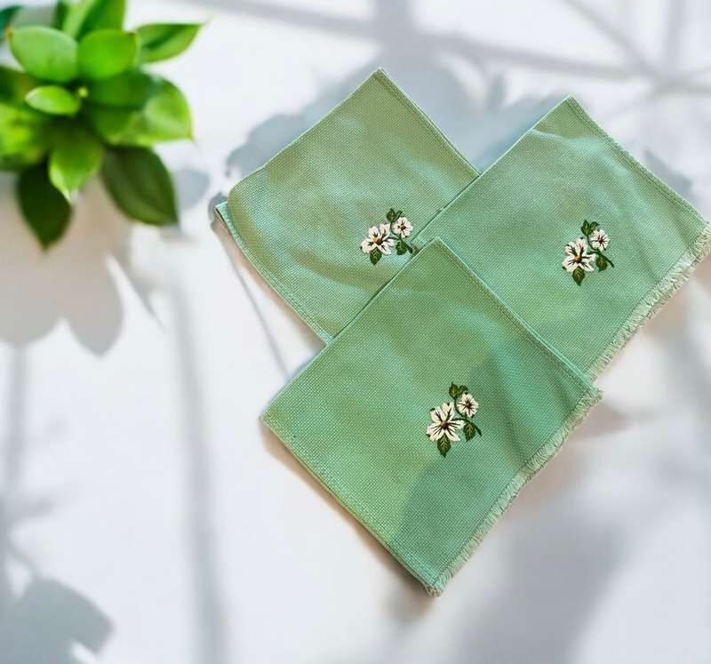 Hand towels/cloths embroidered each