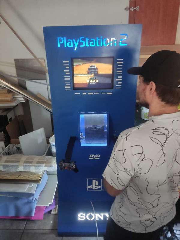 PS2 Kiosk - Playstation 2 (With console and games)
