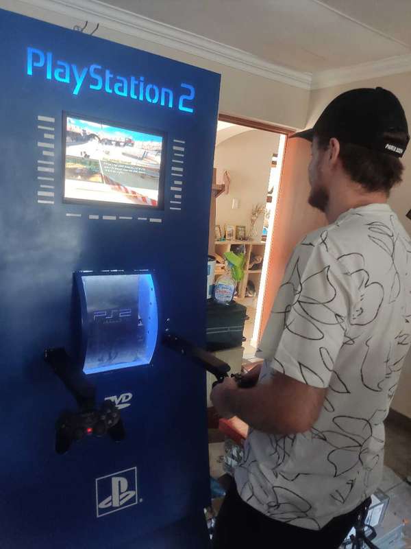 PS2 Kiosk - Playstation 2 (With console and games)
