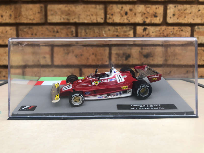 Ferrari 312 T2 - 1977, 1977 Brazilian GP (#11, Niki Lauda) model + magazine