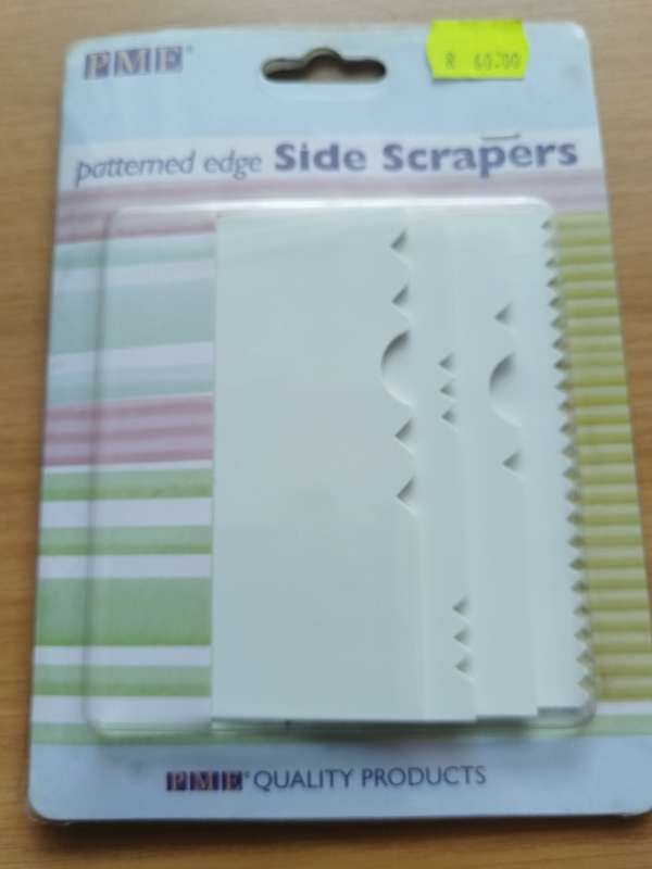 Patterned edge sideScrapers