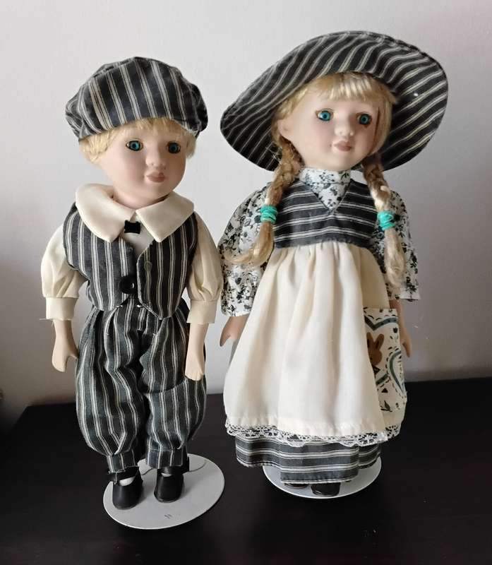 Pair of Vintage Porcelain Dolls on Stands