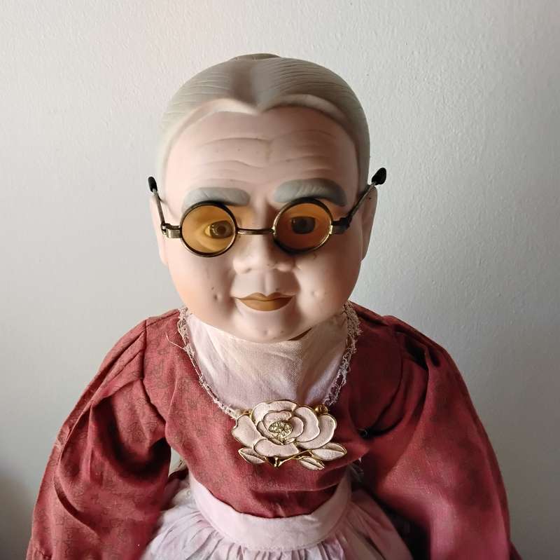 Vintage Granny Porcelain Doll on Wooden Stand