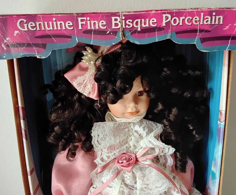 Collectors Choice Limited Edition Bisque Porcelain Doll with stand and COA