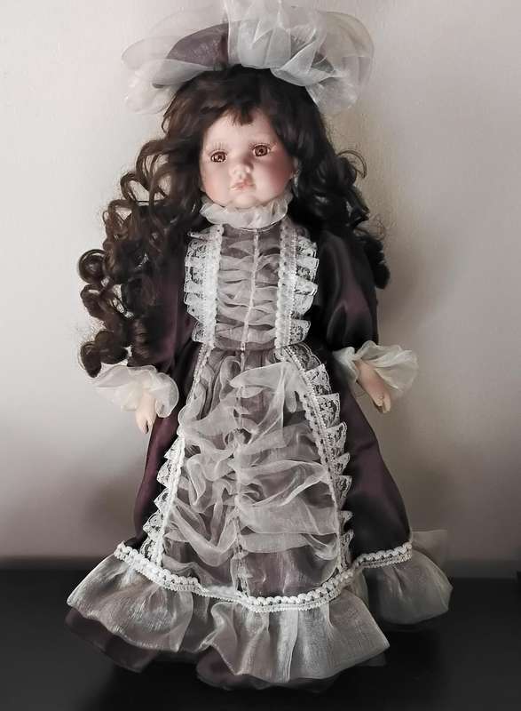 Vintage Porcelain Doll on Stand
