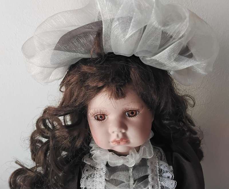 Vintage Porcelain Doll on Stand