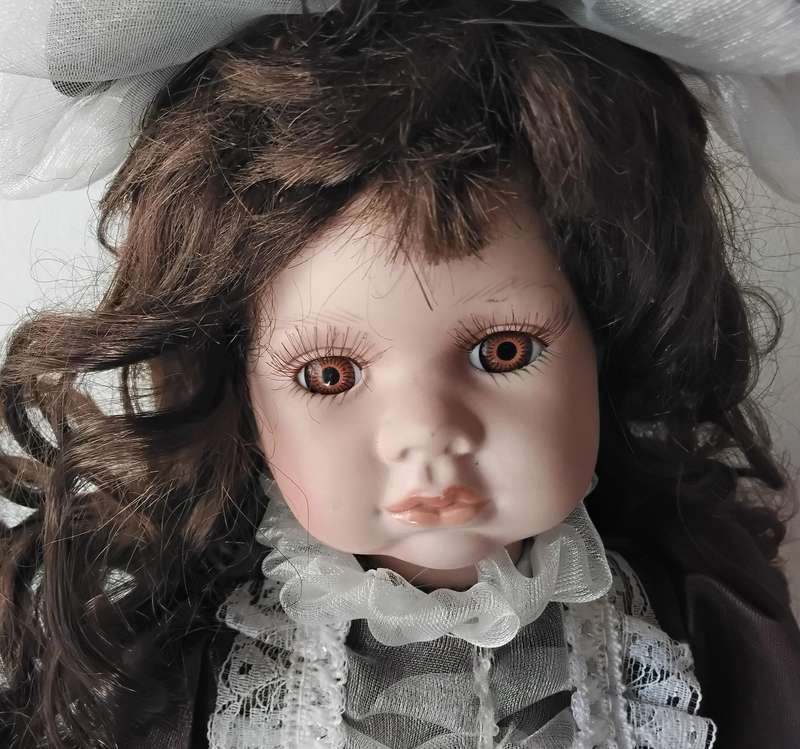 Vintage Porcelain Doll on Stand