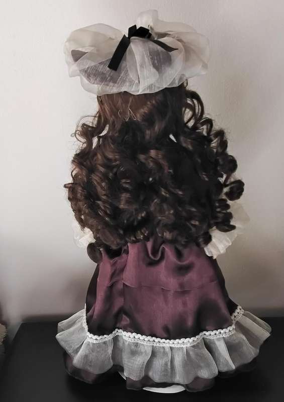 Vintage Porcelain Doll on Stand