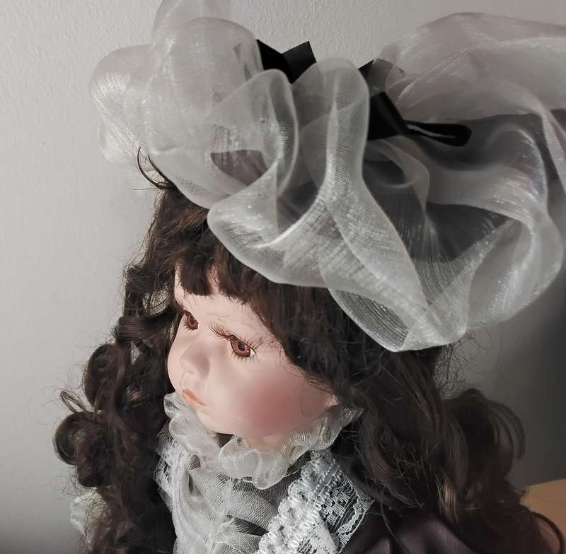 Vintage Porcelain Doll on Stand