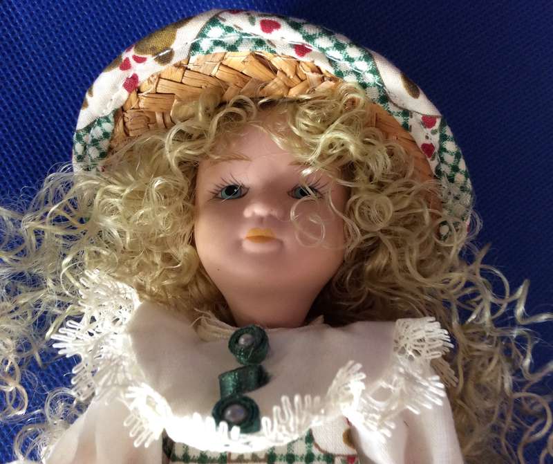 Two Small Full Porcelain Body Dolls