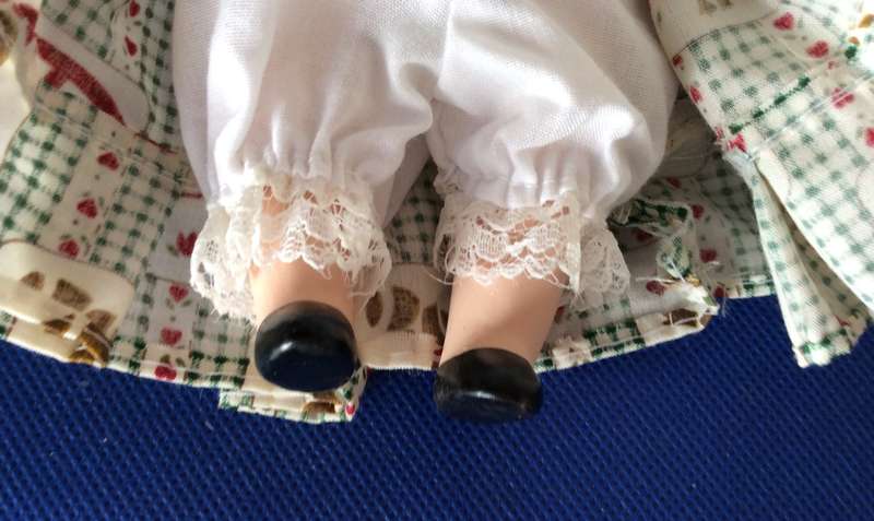 Two Small Full Porcelain Body Dolls