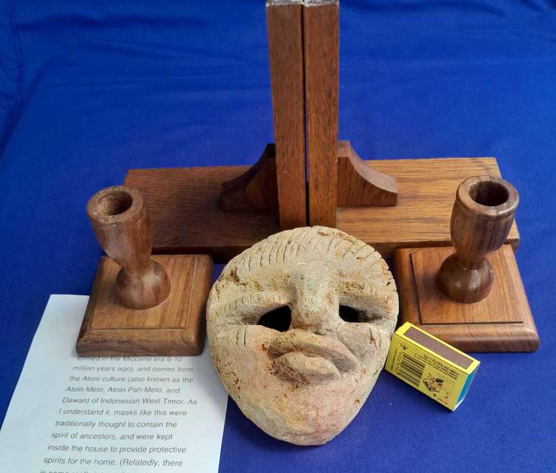 Fossilized  Carved Coral  Animist Mask on assembled Wooden Stand