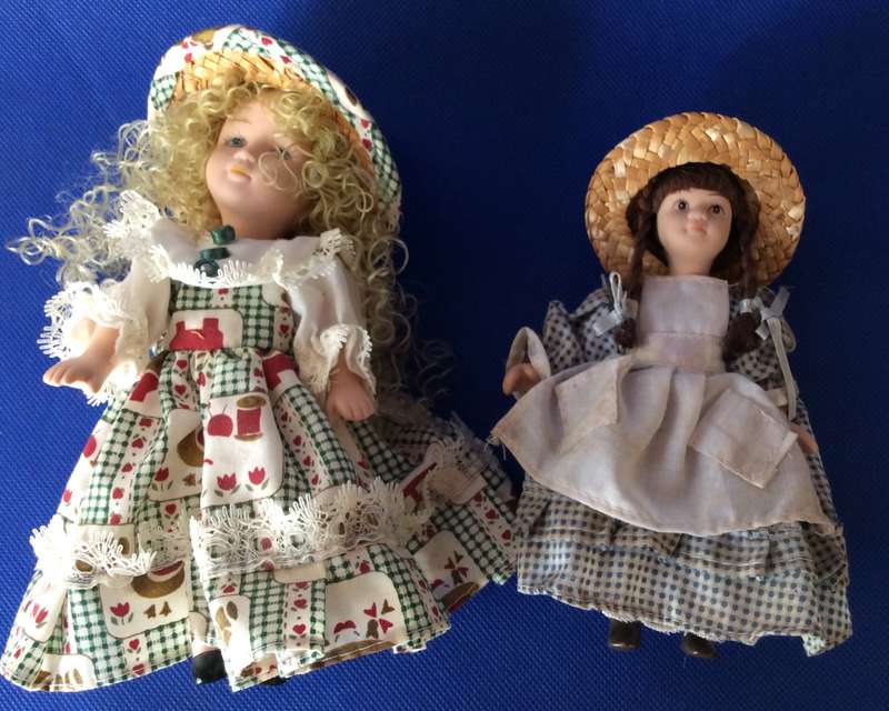 Two Small Full Porcelain Body Dolls