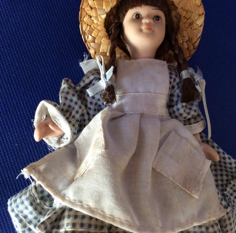 Two Small Full Porcelain Body Dolls