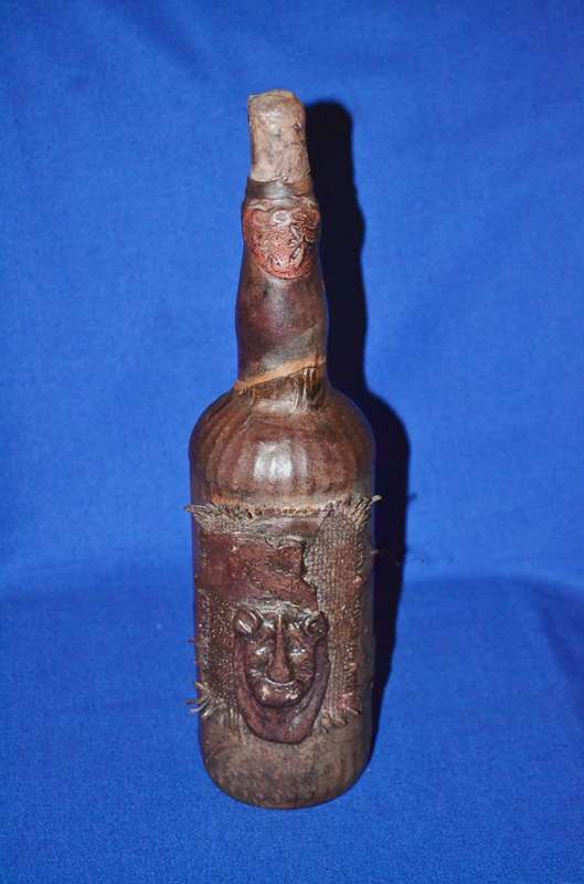 True Vintage Leather wrapped Glass Bottle