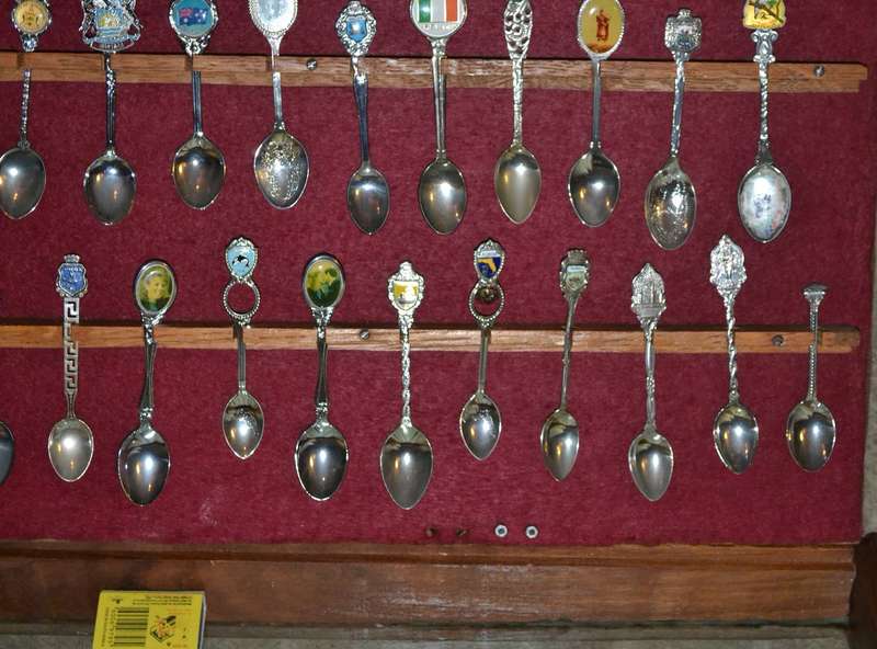 Large Collection of  Vintage Souvenir / Collectable Spoons in Display Case