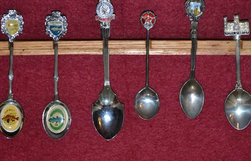 Collection of  Vintage Souvenir / Collectable Spoons in Display Case