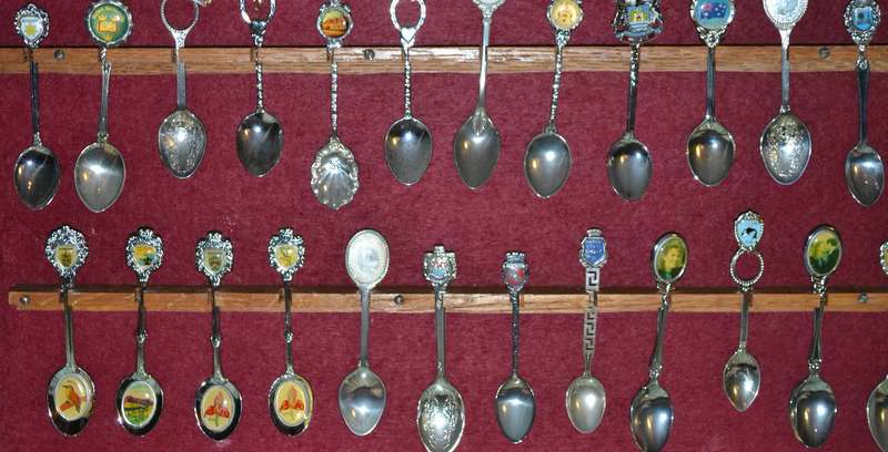 Large Collection of  Vintage Souvenir / Collectable Spoons in Display Case