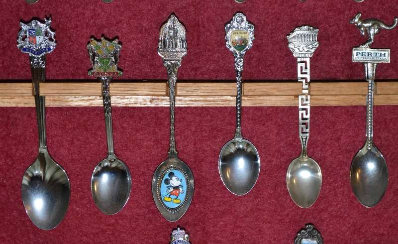 Collection of  Vintage Souvenir / Collectable Spoons in Display Case
