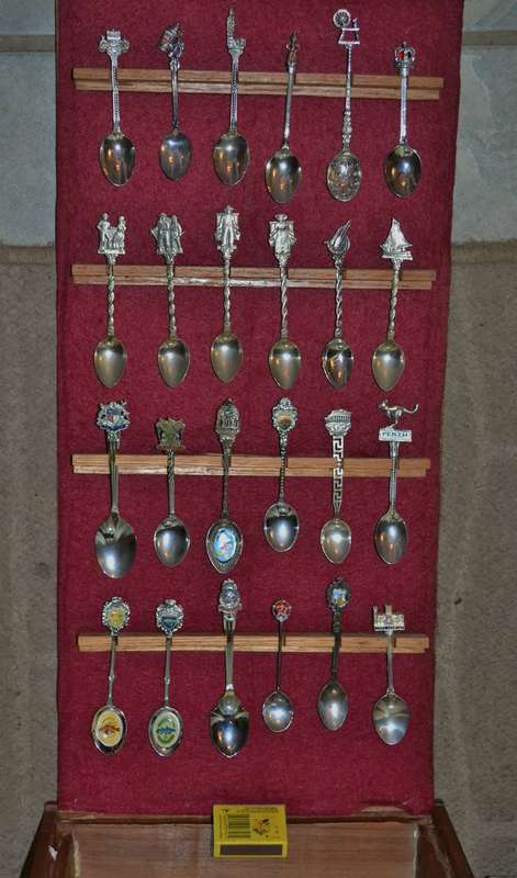 Collection of  Vintage Souvenir / Collectable Spoons in Display Case