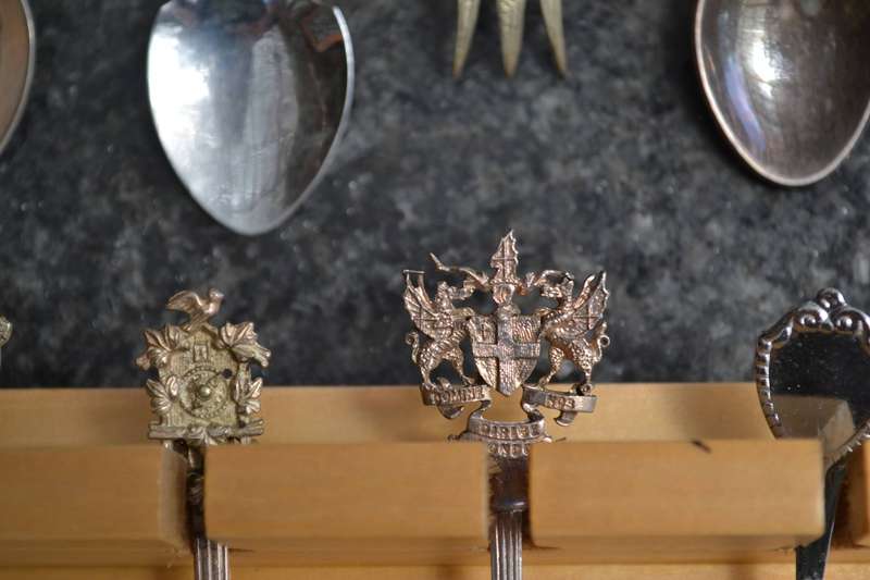 Collectable vintage Charm Style Handle Spoons in wooden Display Rack - 24 Spoons