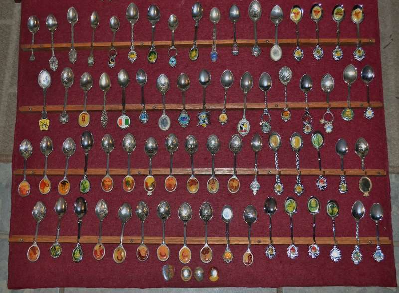 Large Collection of  Vintage Souvenir / Collectable Spoons in Display Case