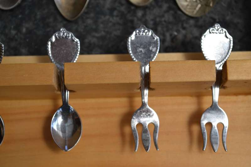 Collectable vintage Charm Style Handle Spoons in wooden Display Rack - 24 Spoons