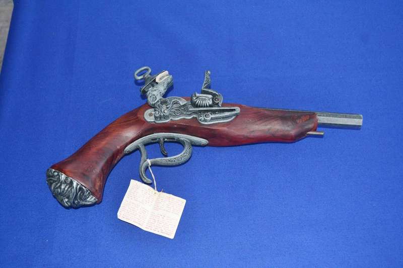 Vintage Replica Antique Snaphance Pistol Displayed on wooden frame