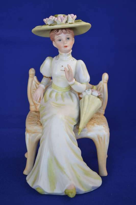 Vintage Bisque Porcelain Figurine Seated in Chair