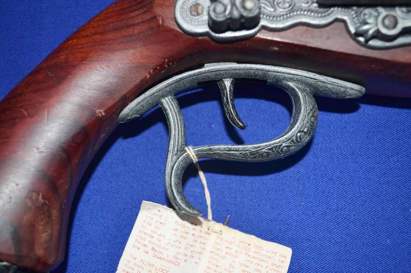 Vintage Replica Antique Snaphance Pistol Displayed on wooden frame
