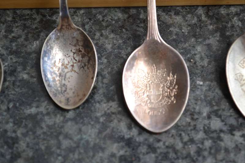 Collectable vintage Charm Style Handle Spoons in wooden Display Rack - 24 Spoons