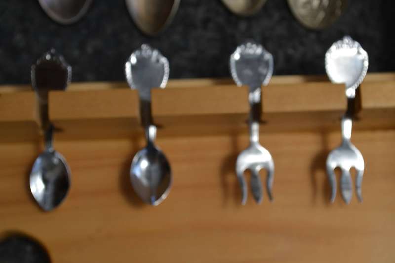 Collectable vintage Charm Style Handle Spoons in wooden Display Rack - 24 Spoons