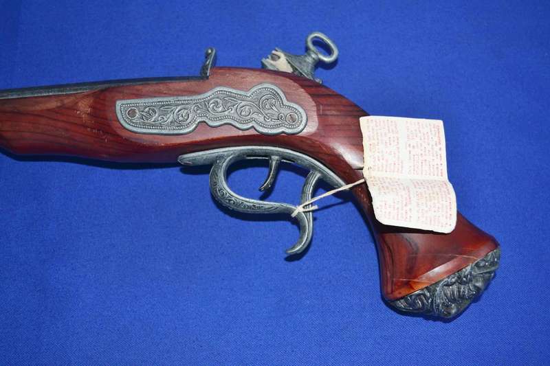 Vintage Replica Antique Snaphance Pistol Displayed on wooden frame