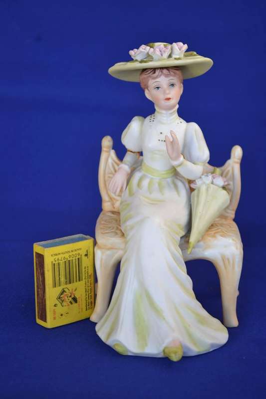 Vintage Bisque Porcelain Figurine Seated in Chair