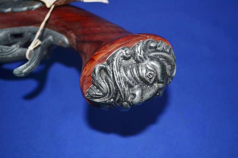 Vintage Replica Antique Snaphance Pistol Displayed on wooden frame