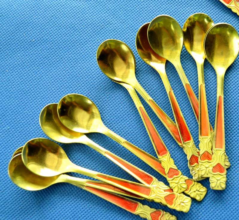 Collection of 35 Small Gold toned Spoons