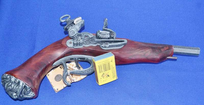Vintage Replica Antique Snaphance Pistol Displayed on wooden frame