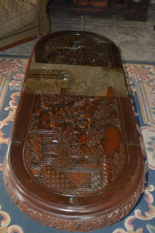 Chinese Oval Coffee Table with Carved Battle Scene